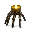 Halloweenová LED svíčka – kostlivá ruka – na baterie – 9 x 7,5 x 7,5 cm