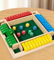 Barevná kostkovaná společenská hra